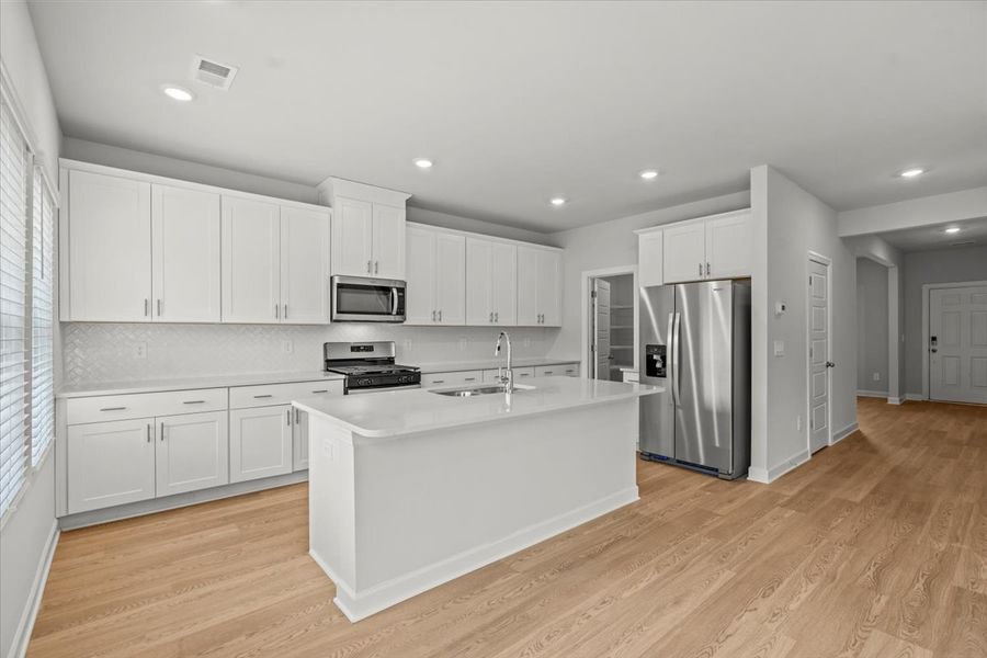 Furnished interior view inside a new home in Chatham Forest, Duncan (Image 9).