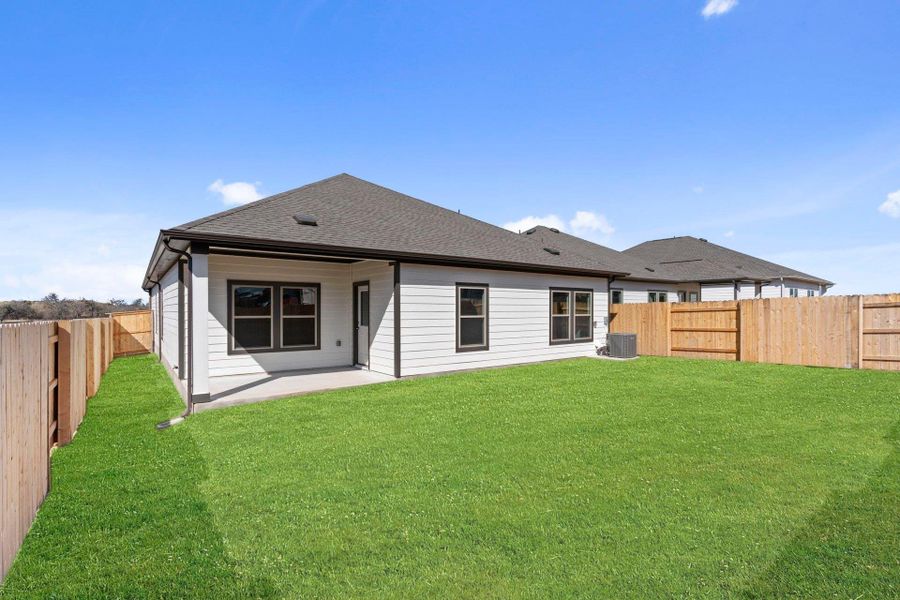 Rear of Home and Private Backyard