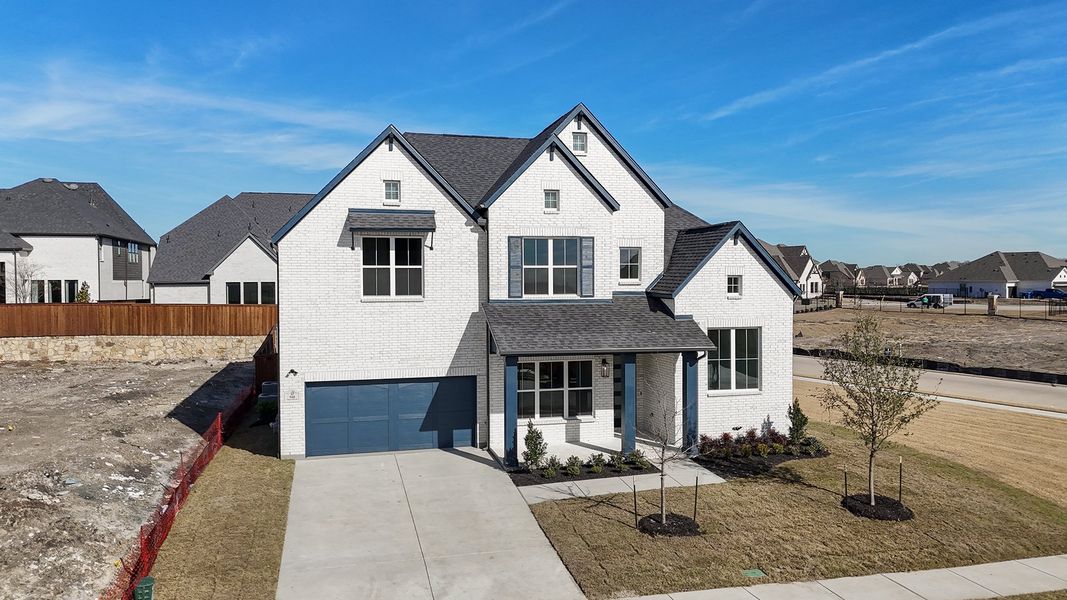 Front exterior of a new home in Quail Hollow, Rockwall, TX, highlighting curb appeal (Image 25).