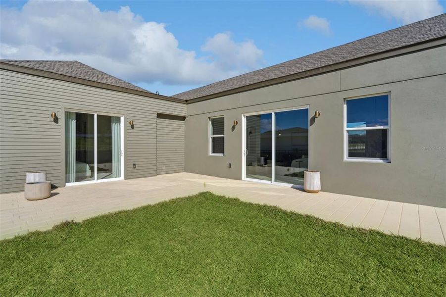 Exterior details and patio area of a home in , Lady Lake (Image 3). Exterior details and patio area of a home in , Lady Lake (Image 3).