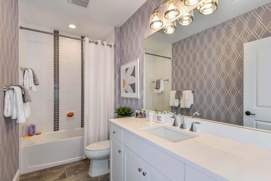 Representative furnished interior of a home built from the Honor by Neal Communities in Grand Park, Sarasota (Image 7).