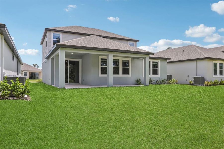 Exterior details and patio area of a home in Legends Preserve - Signature Series, Daytona Beach (Image 26).