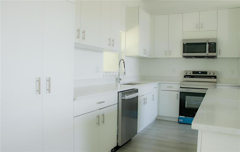 Furnished interior view inside a new home in , Port Charlotte (Image 5).