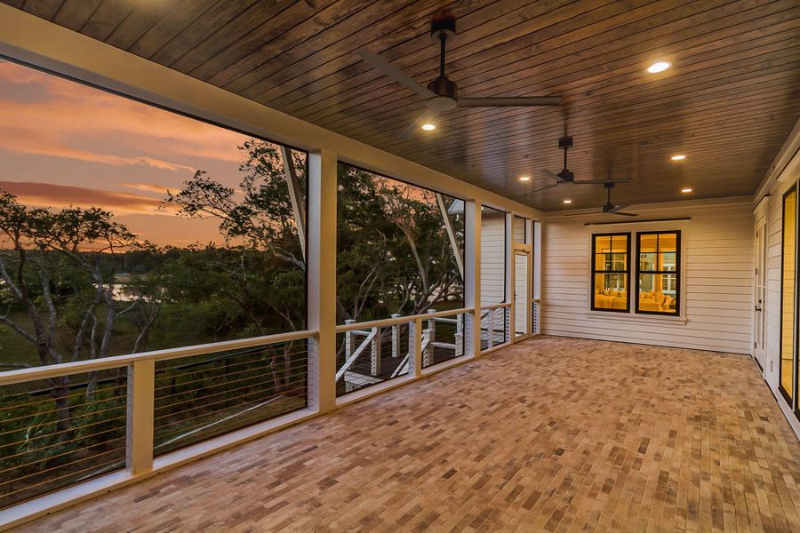 Exterior details and patio area of a home in Daniel Island Park, Charleston (Image 37).