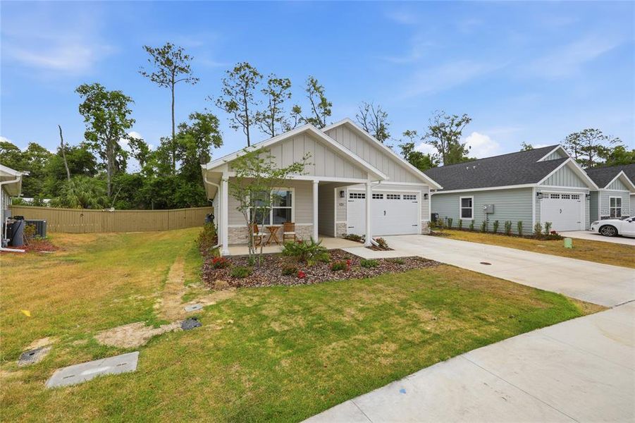 Front exterior of a new home in , Gainesville, FL, highlighting curb appeal (Image 28).