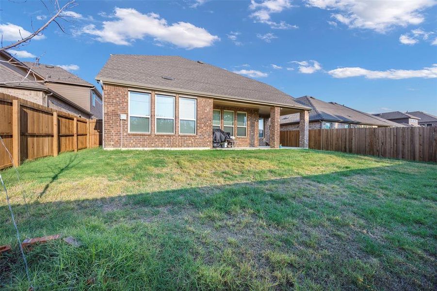 Exterior details and patio area of a home in Silverado, Aubrey (Image 4).