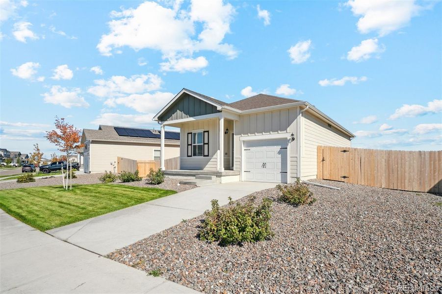 Exterior details and patio area of a home in Cottonwood Greens, Fort Lupton (Image 3).