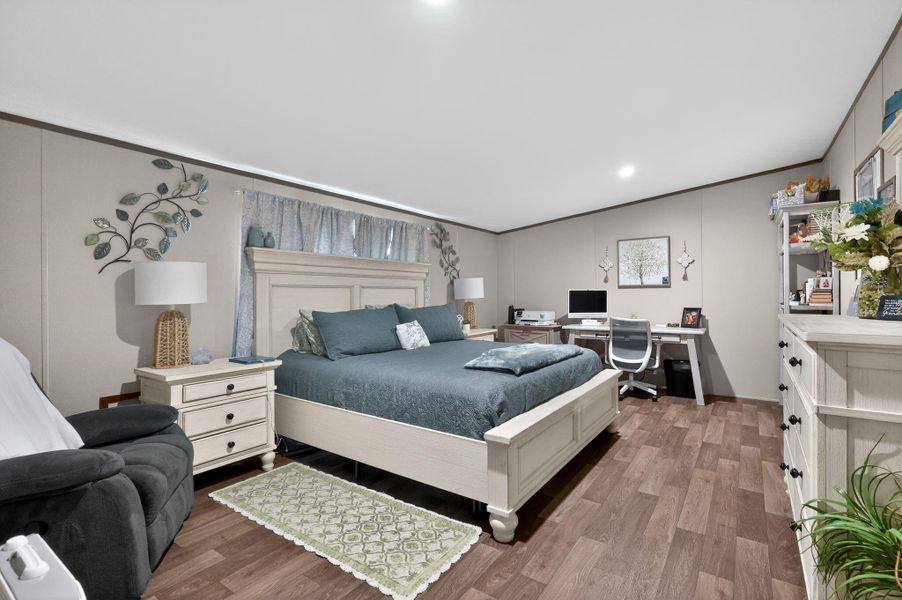 Another view of primary bedroom