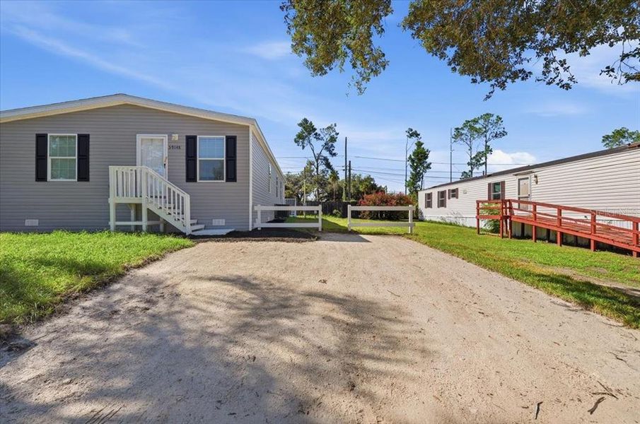 Exterior details and patio area of a home in , Zephyrhills (Image 20).