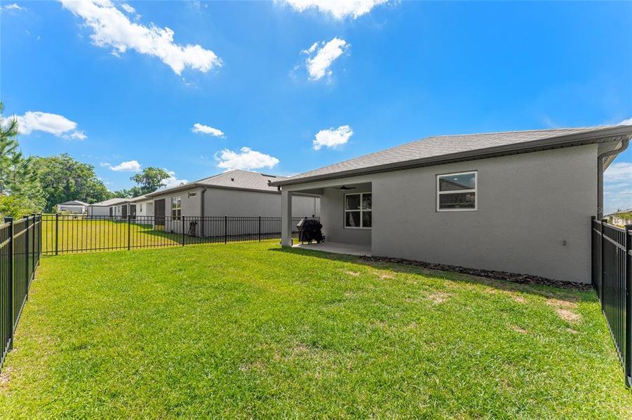Exterior details and patio area of a home in Del Webb Stone Creek, Ocala (Image 4).