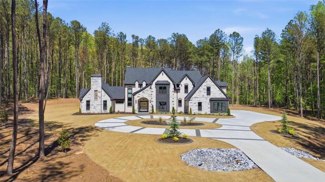 Front exterior of a new home in , Tyrone, GA, highlighting curb appeal (Image 23). Front exterior of a new home in , Tyrone, GA, highlighting curb appeal (Image 23).