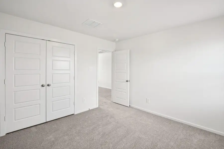 Spacious, unfurnished interior of a new home in Landing Meadows - Traditional Series, New Caney (Image 36).