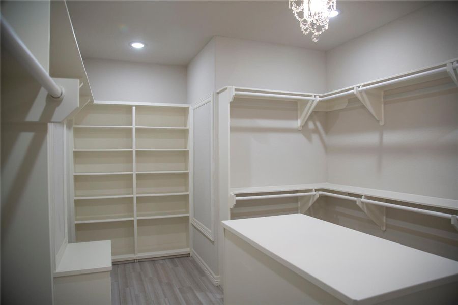 One view of this massive primary closet. One view of this massive primary closet.