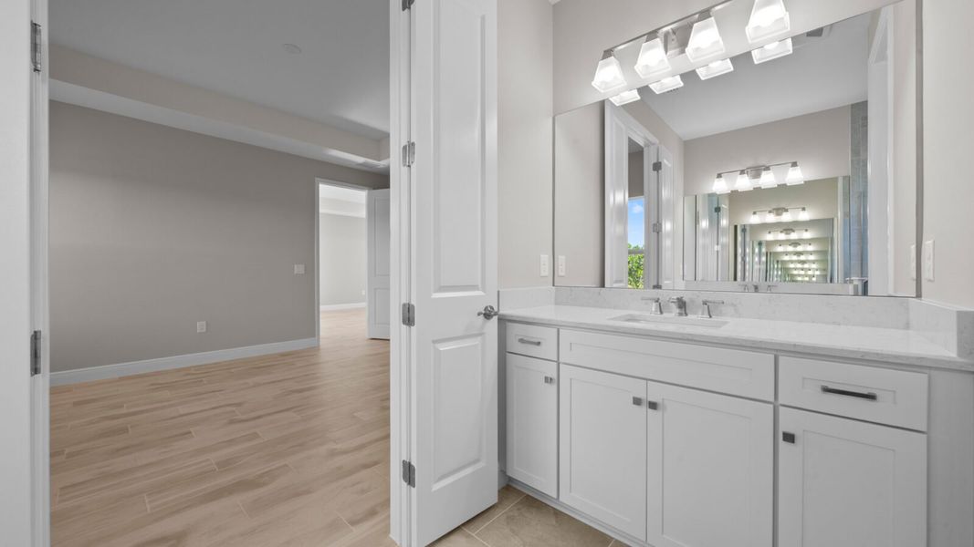 Furnished interior view inside a new home in Verandah, Fort Myers (Image 10).