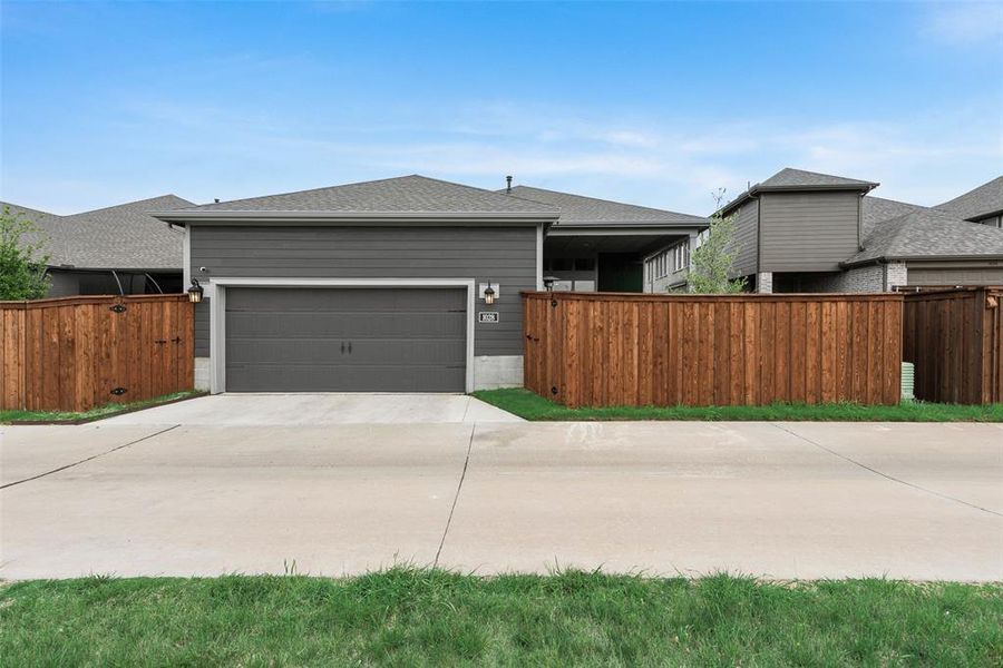 Front exterior of a new home in Karis - Village Series, Crowley, TX, highlighting curb appeal (Image 1). Front exterior of a new home in Karis - Village Series, Crowley, TX, highlighting curb appeal (Image 1).