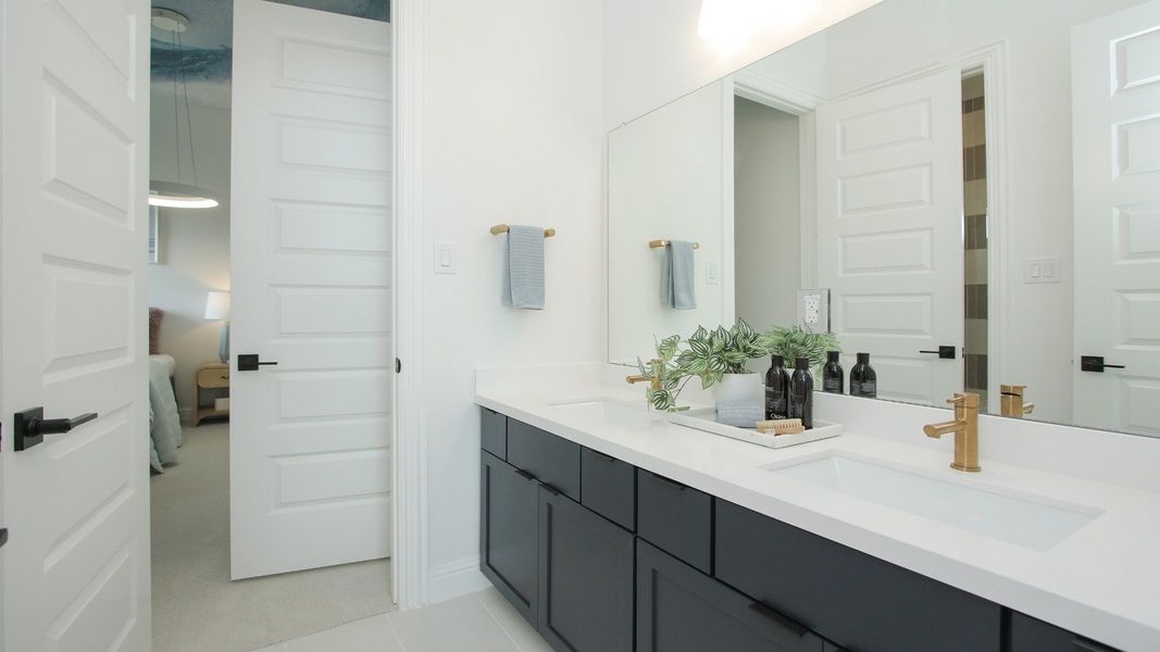 Representative furnished interior of a home built from the Willow by Brightland Homes in Sunterra, Katy (Image 15).