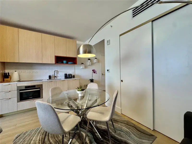 Furnished interior view inside a new home in , Miami (Image 12).