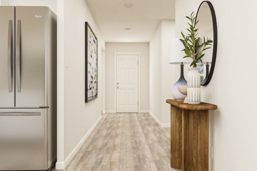 A hallway with white walls.