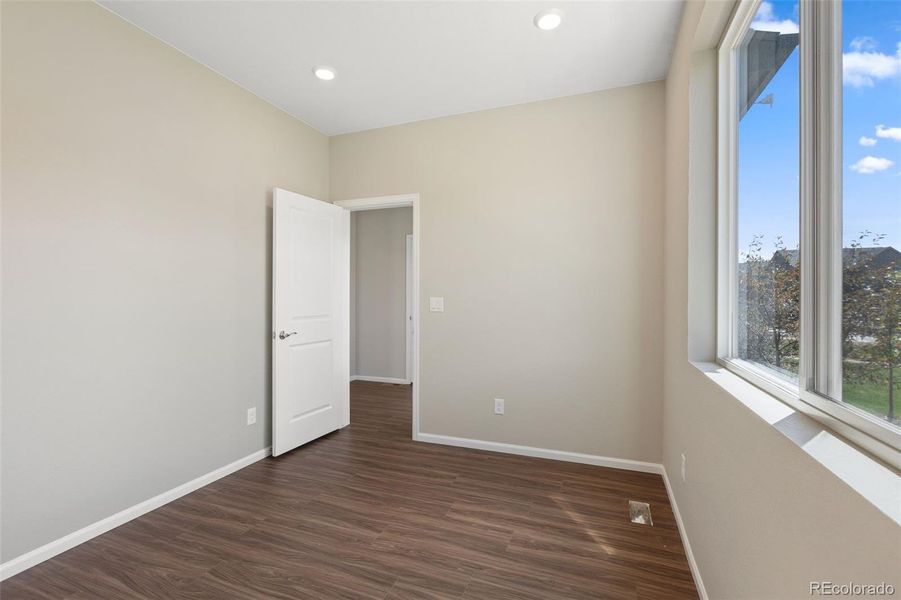 Spacious, unfurnished interior of a new home in Woodrose at Painted Prairie, Aurora (Image 23).