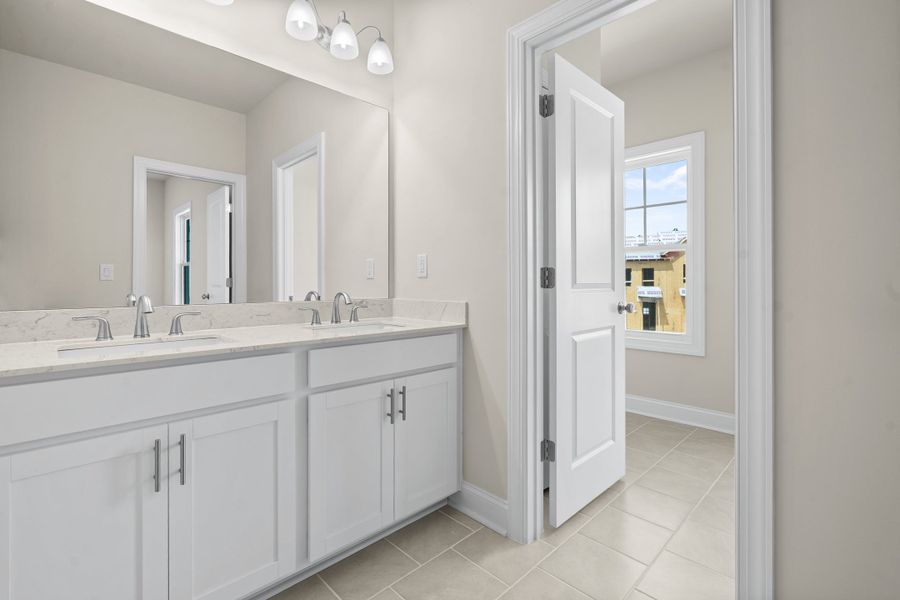 Representative furnished interior of a home built from the The Carter by The Providence Group in Aberdeen, Hoschton (Image 14).