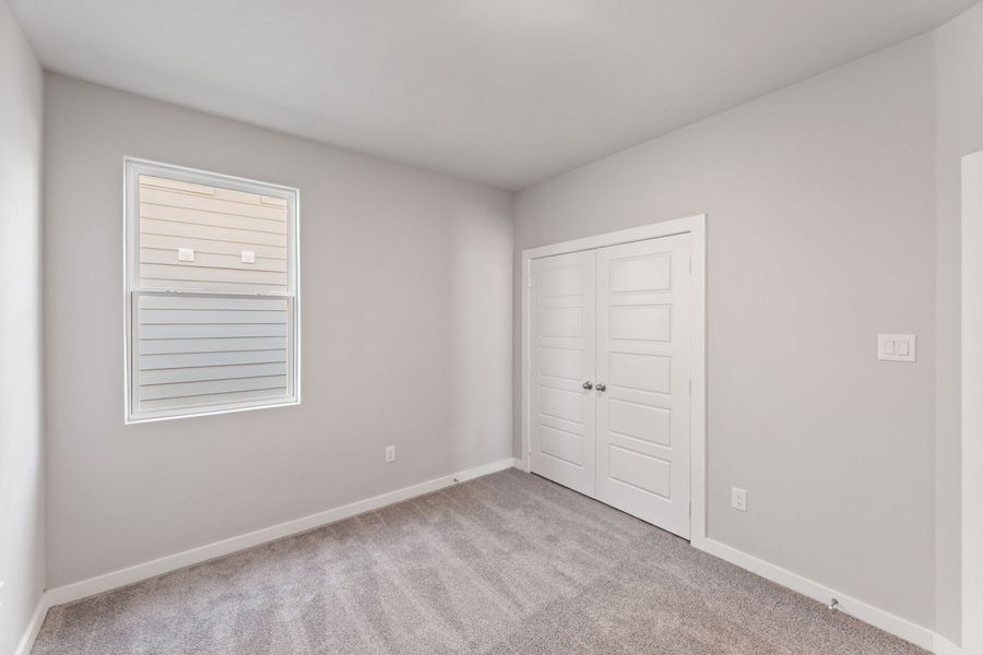 Spacious, unfurnished interior of a new home in Hunters Ranch, San Antonio (Image 20).