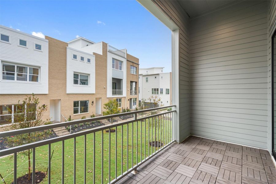 Exterior details and patio area of a home in Austin Modern Lofts at Mueller, Austin (Image 22).