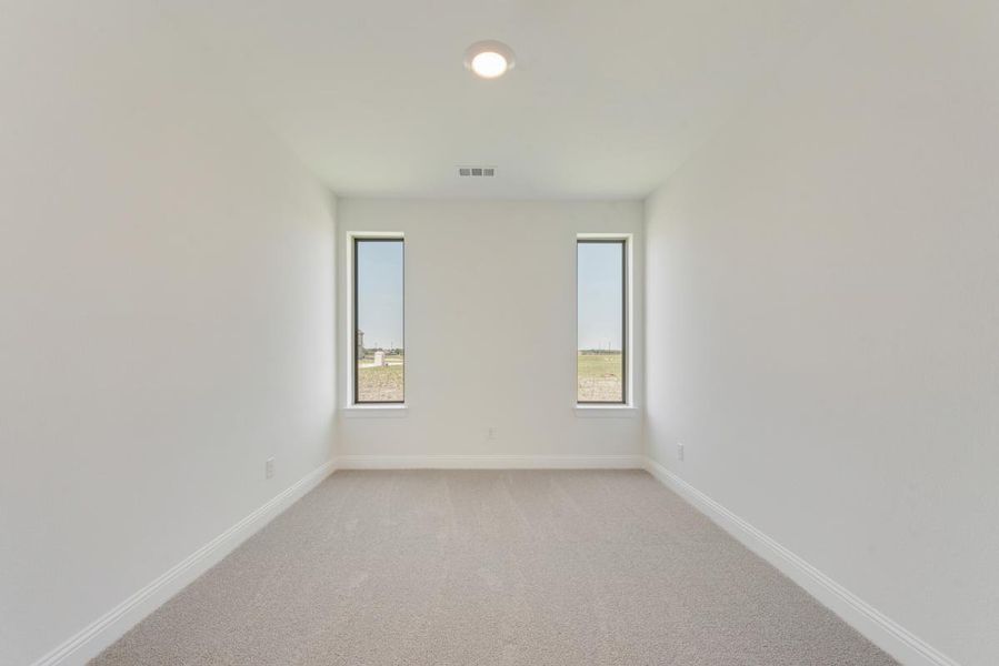 Representative unfurnished interior of a home built from the Grand Silverwood by Grand Homes in Grand Oaks, Celina (Image 15).