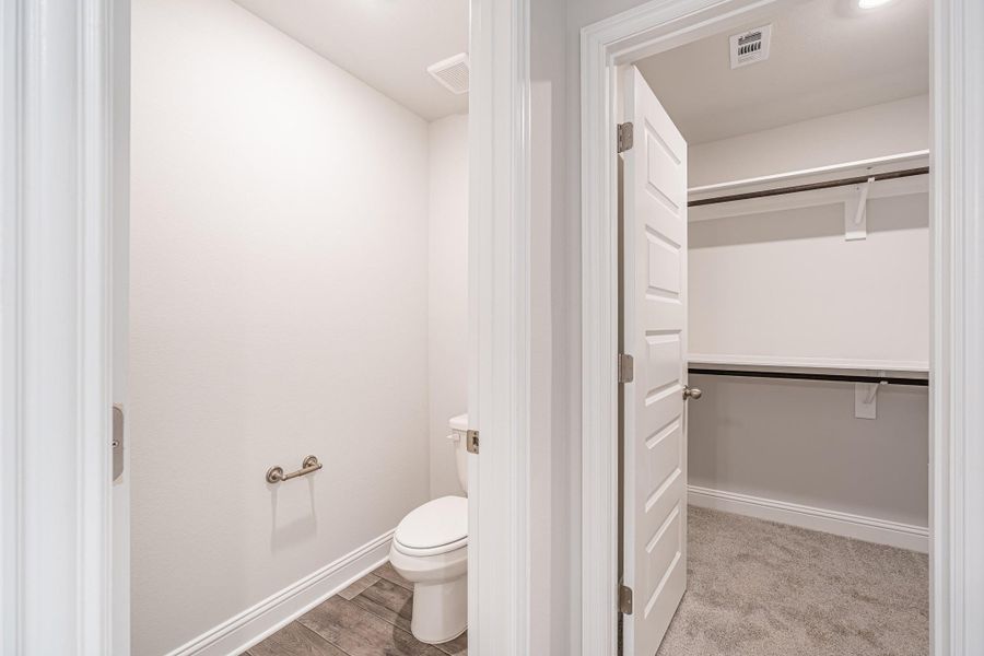 Primary bath with walk in closet Primary bath with walk in closet