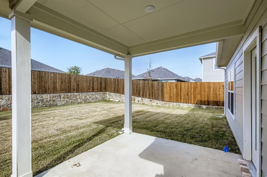 Exterior details and patio area of a home in Ambergrove, Royse City (Image 4).