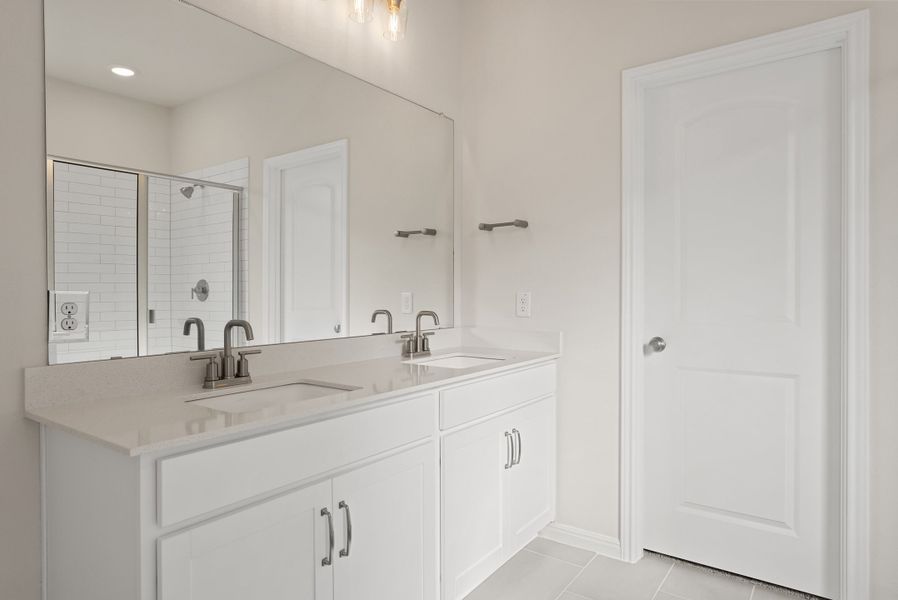 Representative furnished interior of a home built from the Somerville by Ashton Woods in Willow Springs, Buda (Image 13).
