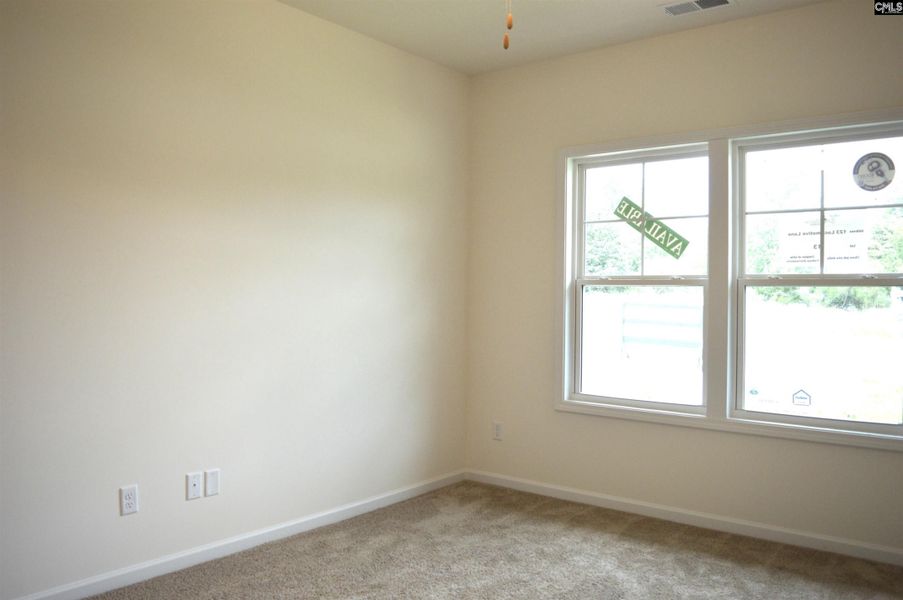 Spacious, unfurnished interior of a new home in Bickley Station, Irmo (Image 16).