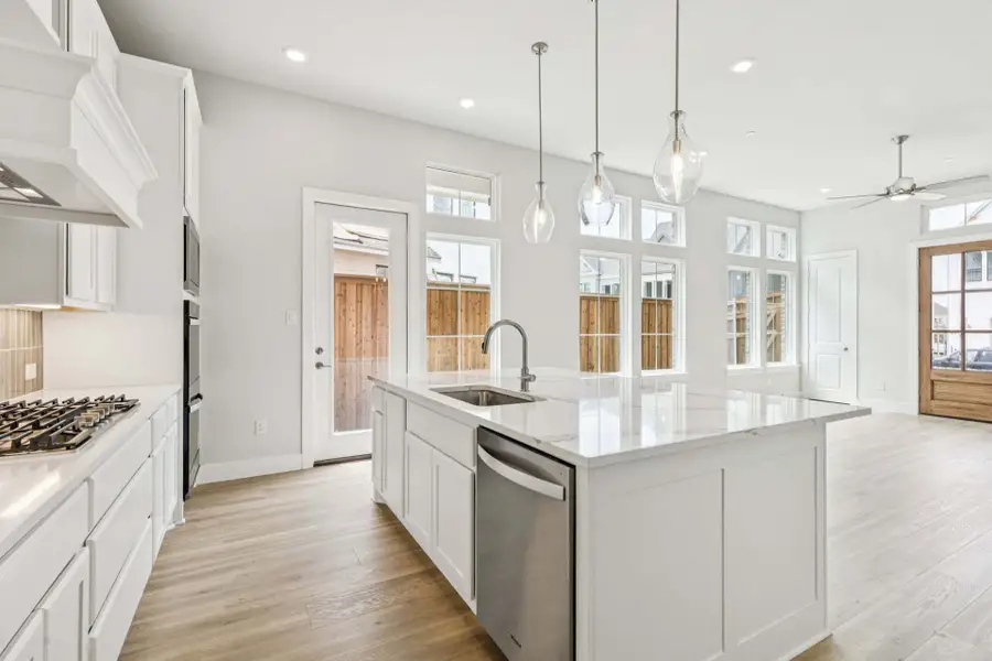 Furnished interior view inside a new home in Newman Village Townhomes, Frisco (Image 10).