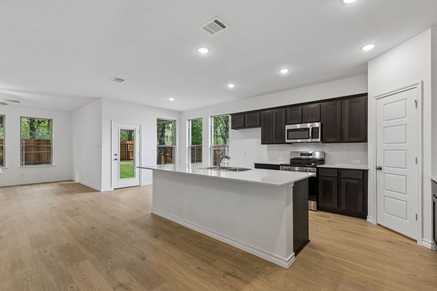 Furnished interior view inside a new home in Eagle Cove, Denton (Image 7).