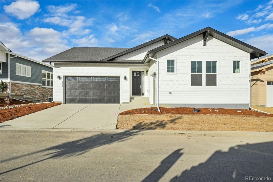 Front exterior of a new home in , Fort Collins, CO, highlighting curb appeal (Image 26).