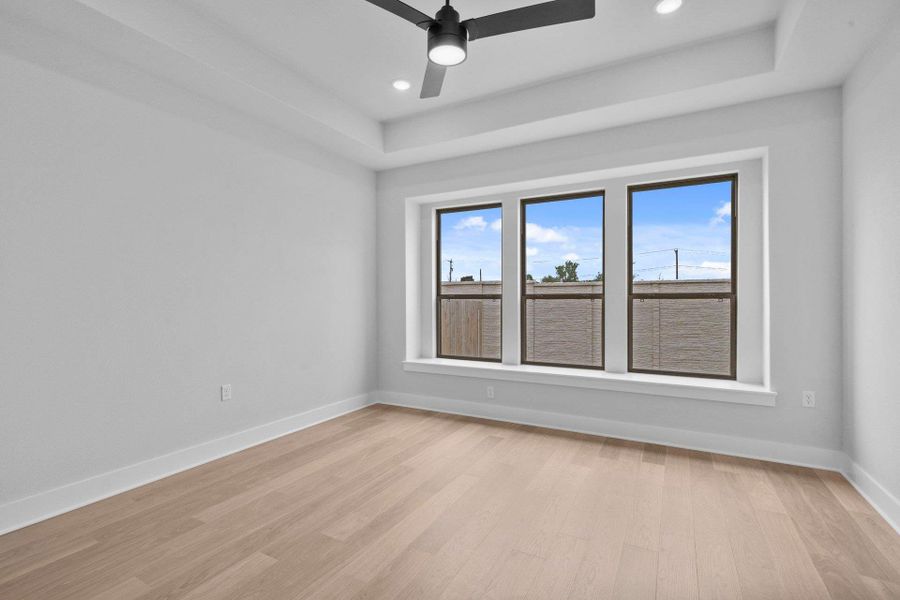 Primary Bedroom with tray ceiling Primary Bedroom with tray ceiling