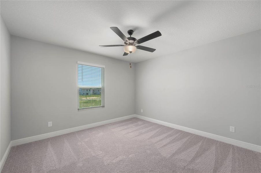 Spacious, unfurnished interior of a new home in Gum Lake Preserve, Lake Alfred (Image 27).