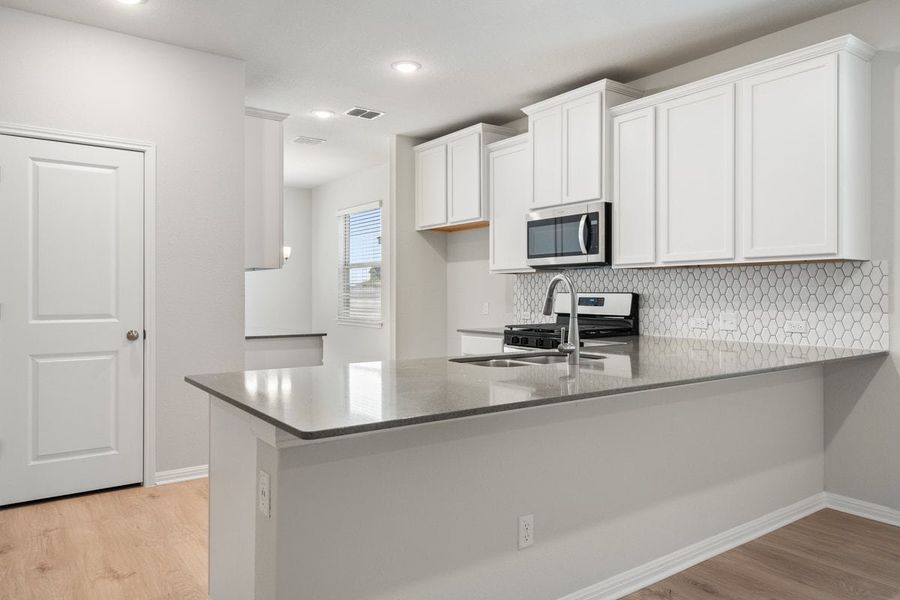 Furnished interior view inside a new home in Sage Hollow, Kyle (Image 3). Furnished interior view inside a new home in Sage Hollow, Kyle (Image 3).