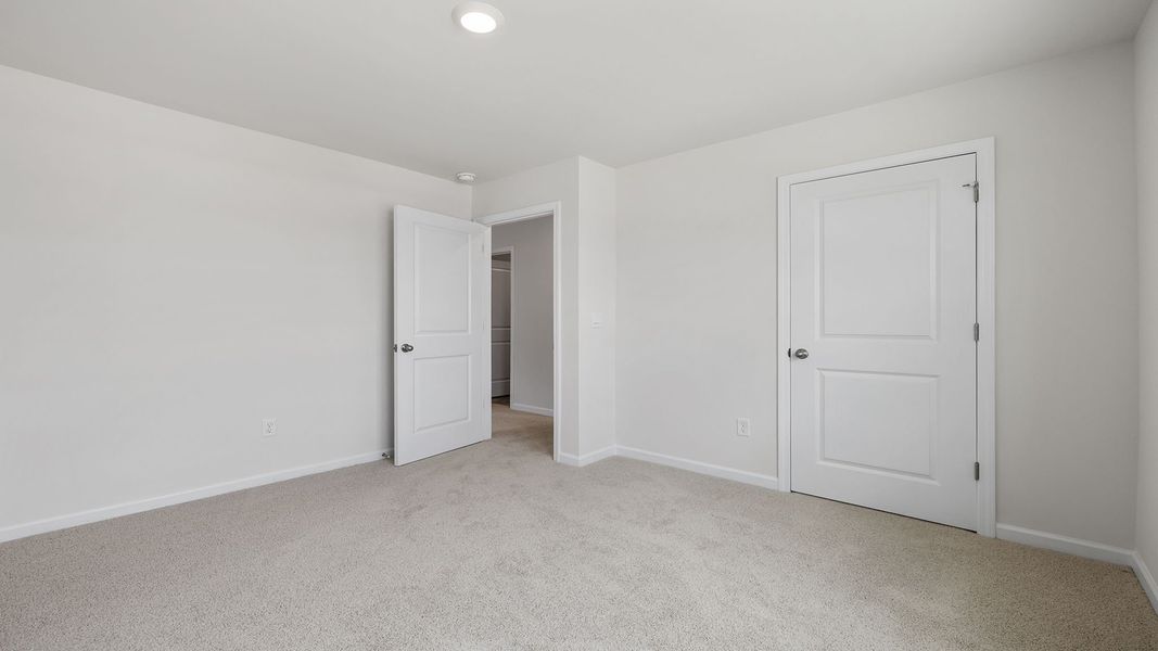 Spacious, unfurnished interior of a new home in Durbin Meadows Traditions, Fountain Inn (Image 20).