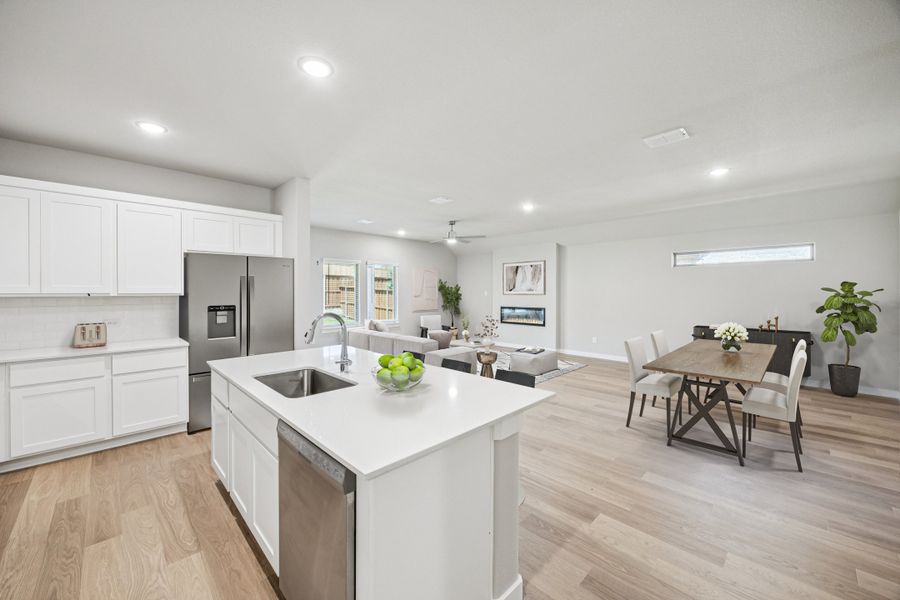 Kitchen in the Oscar home plan by Trophy Signature Homes – REPRESENTATIVE PHOTO Kitchen in the Oscar home plan by Trophy Signature Homes – REPRESENTATIVE PHOTO