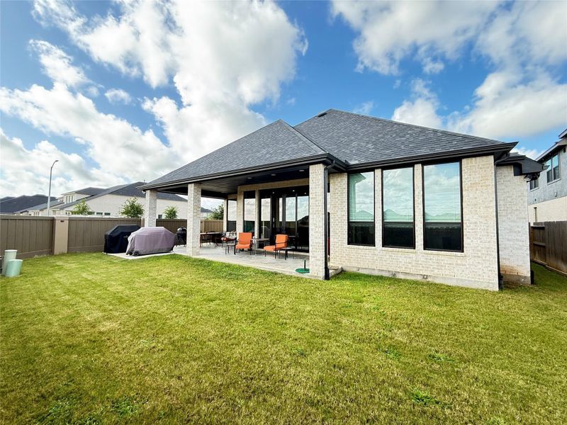 Exterior details and patio area of a home in Cross Creek West, Fulshear (Image 23).