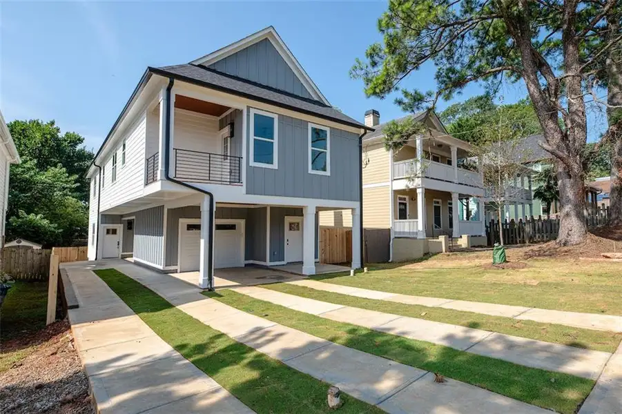 Front exterior of a new home in , Atlanta, GA, highlighting curb appeal (Image 17).