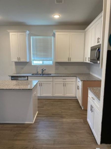 Furnished interior view inside a new home in Myrtle Gardens, Magnolia (Image 11). Furnished interior view inside a new home in Myrtle Gardens, Magnolia (Image 11).