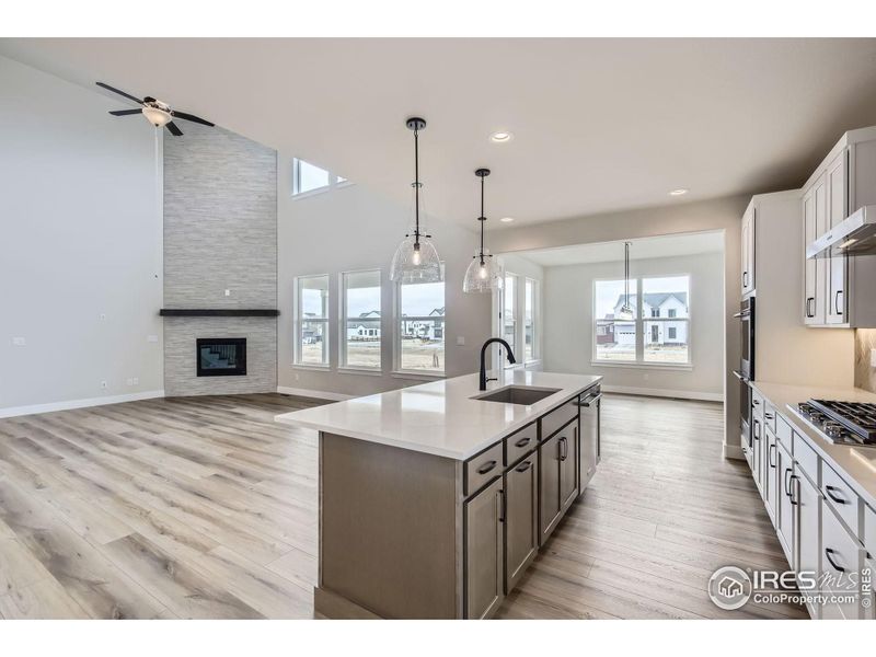 Furnished interior view inside a new home in RainDance National 60/70, Windsor (Image 14).
