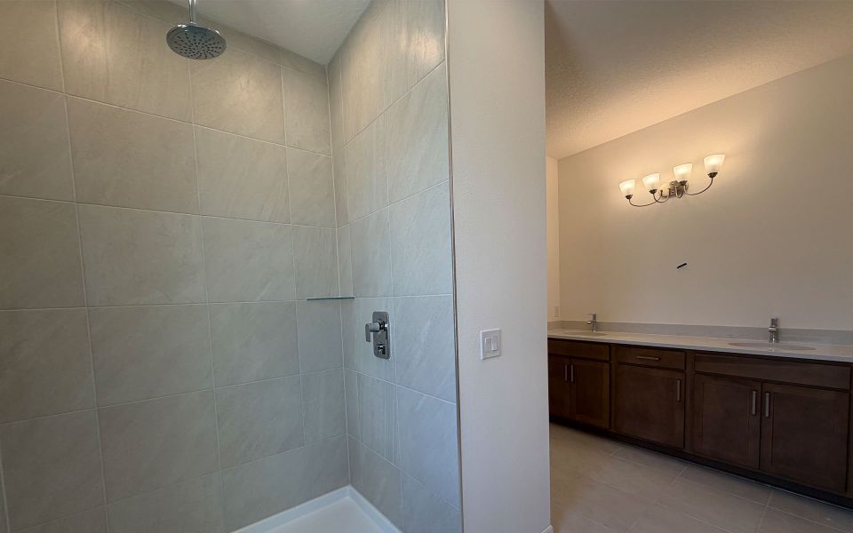 Modern Primary Bathroom with Stylish Features in Central Florida House