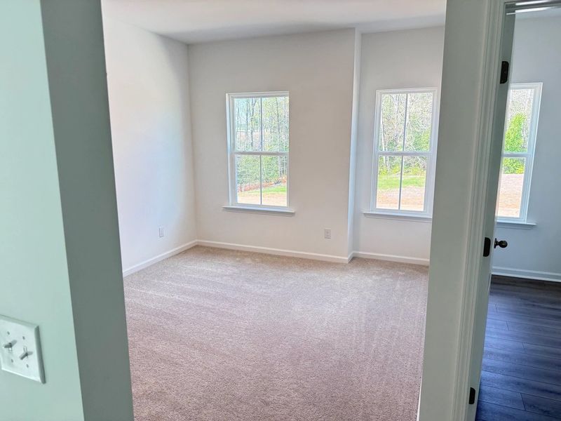 Spacious, unfurnished interior of a new home in Rowland's Grant, Fuquay Varina (Image 21).