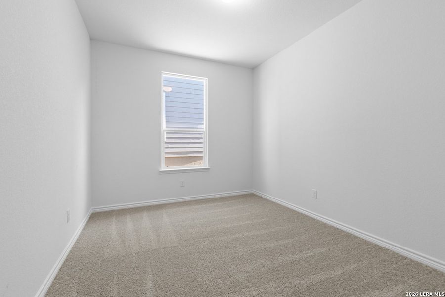 Spacious, unfurnished interior of a new home in Hidden Bluffs at TRP, San Antonio (Image 27).