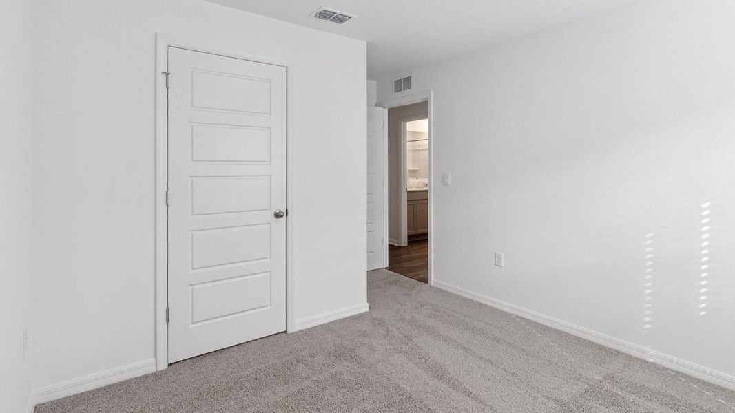 Representative unfurnished interior of a home built from the Dundee by D.R. Horton in Leoma's Landing, Lake Wales (Image 24).