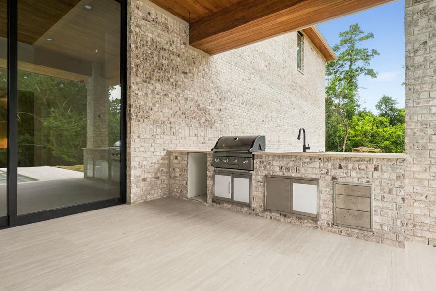 Exterior details and patio area of a home in , Tomball (Image 3).