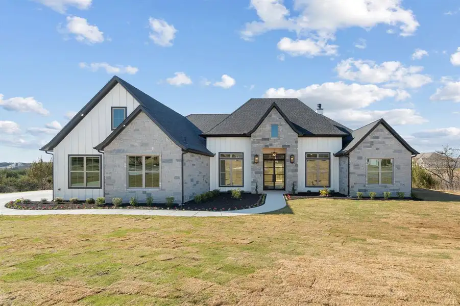 Front exterior of a new home in , Weatherford, TX, highlighting curb appeal (Image 1). Front exterior of a new home in , Weatherford, TX, highlighting curb appeal (Image 1).