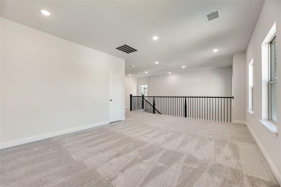 Spacious, unfurnished interior of a new home in Spiritas Ranch, Little Elm (Image 25).